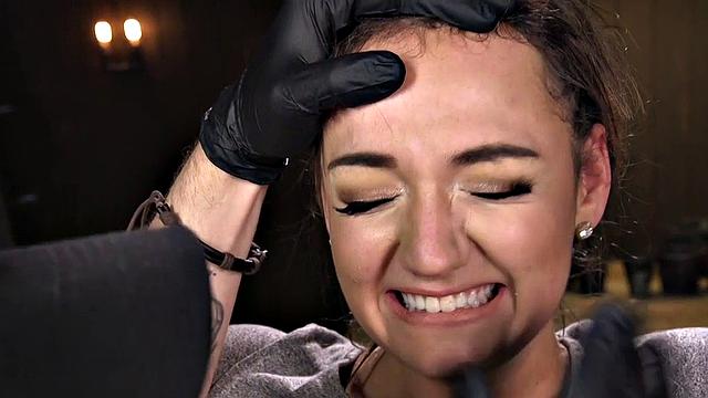 Gagged BDSM slave fingered by master