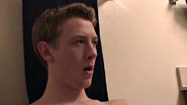 Sitting on the toilet, shirtless Corbin works his cock inside his pants. Then he tugs down his jeans and boxers before he's fully hard, which gives us the pleasure of watching him lube up and grow a stiffy.