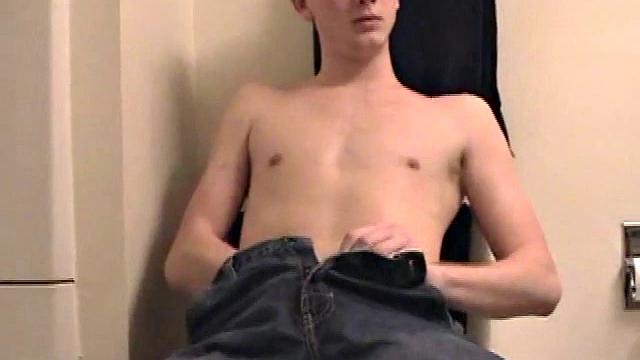 Sitting on the toilet, shirtless Corbin works his cock inside his pants. Then he tugs down his jeans and boxers before he's fully hard, which gives us the pleasure of watching him lube up and grow a stiffy.