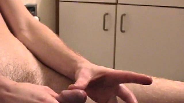 Sitting on the toilet, shirtless Corbin works his cock inside his pants. Then he tugs down his jeans and boxers before he's fully hard, which gives us the pleasure of watching him lube up and grow a stiffy.