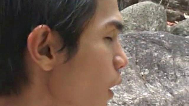Asian boys Moo and Hack are on a hike and decide to strip down by a cool stream. It isn't long before Moo goes down on Hack. Then he rolls over and Moo starts licking his ass.