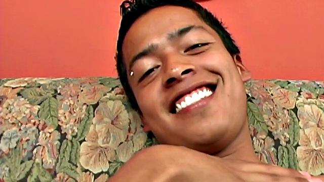 We join Latin boy Fabiano parked on the couch and ready to jerk off. It isn't long before he's stripped naked and fingering his little ass. The added stimulation soon has him boned up and ready to get himself off.