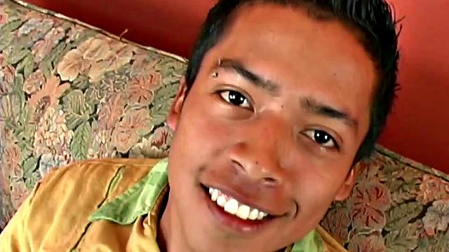 We join Latin boy Fabiano parked on the couch and ready to jerk off. It isn't long before he's stripped naked and fingering his little ass. The added stimulation soon has him boned up and ready to get himself off.