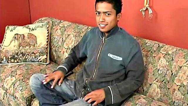We join Latin boy Fabiano parked on the couch and ready to jerk off. It isn't long before he's stripped naked and fingering his little ass. The added stimulation soon has him boned up and ready to get himself off.