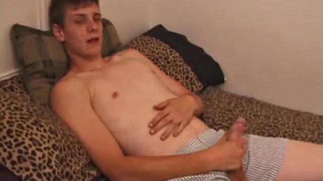 Straight guy Skylerr is horny and wants to beat off to a porn video. He works himself through his pants, and then pulls out his huge dick.