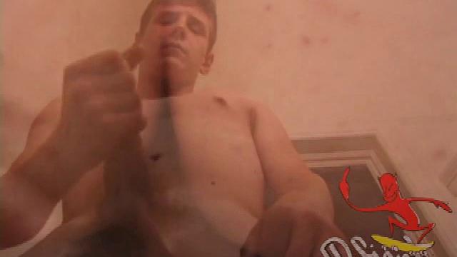 Straight guy Skylerr is horny and wants to beat off to a porn video. He works himself through his pants, and then pulls out his huge dick.