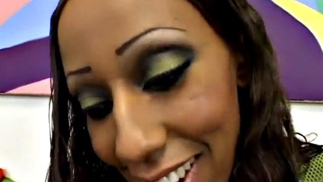 Watch this Ebony teen in high heels get her pussy drilled hard and smile with pleasure