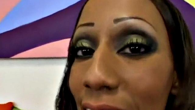 Watch this Ebony teen in high heels get her pussy drilled hard and smile with pleasure