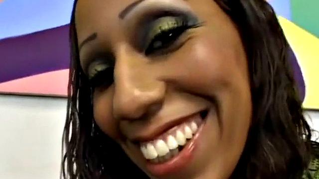 Watch this Ebony teen in high heels get her pussy drilled hard and smile with pleasure
