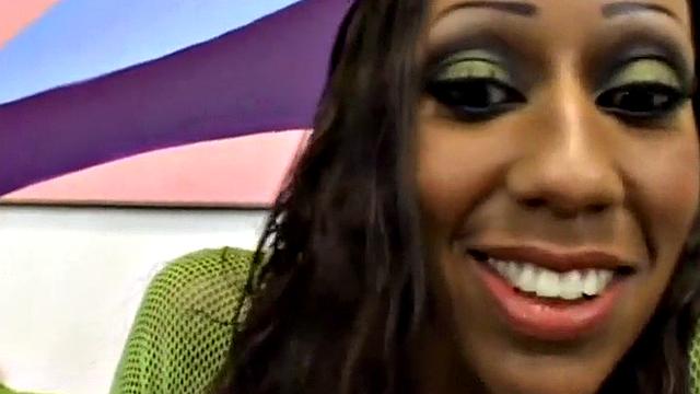 Watch this Ebony teen in high heels get her pussy drilled hard and smile with pleasure