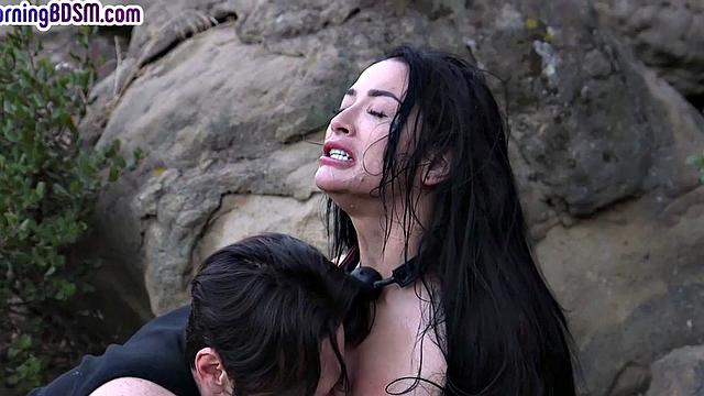 Submissive tattooed babe throat fucked outdoor