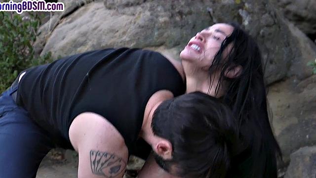 Submissive tattooed babe throat fucked outdoor