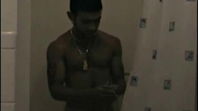 After stripping naked, Cory settles down for a cock servicing.