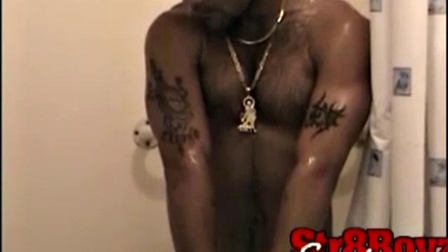 After stripping naked, Cory settles down for a cock servicing.