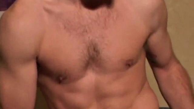 Donovan Woodside works up his boner on sofa with serious stroking and ass play, ending in warm cum