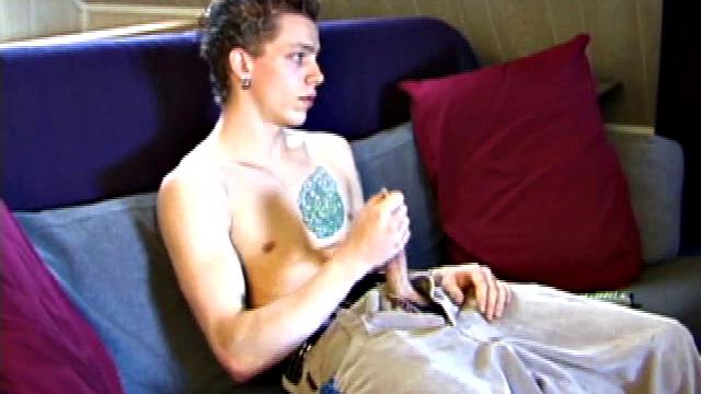 Shane pops in a new x-rated porn video and gets ready for a hot jack off session. He works his stiff dick with both hands, edging himself to a crazy finish. In the end Shane sends a warm cum load flying over his shoulder.