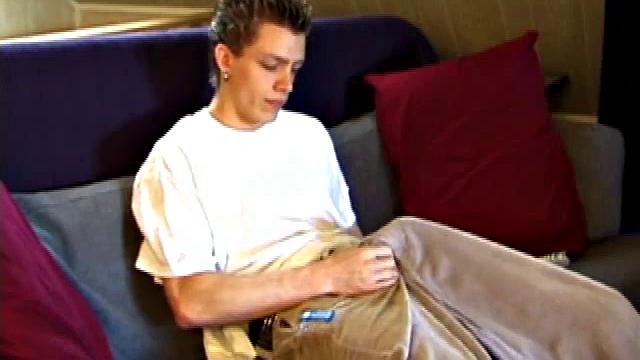 Shane pops in a new x-rated porn video and gets ready for a hot jack off session. He works his stiff dick with both hands, edging himself to a crazy finish. In the end Shane sends a warm cum load flying over his shoulder.