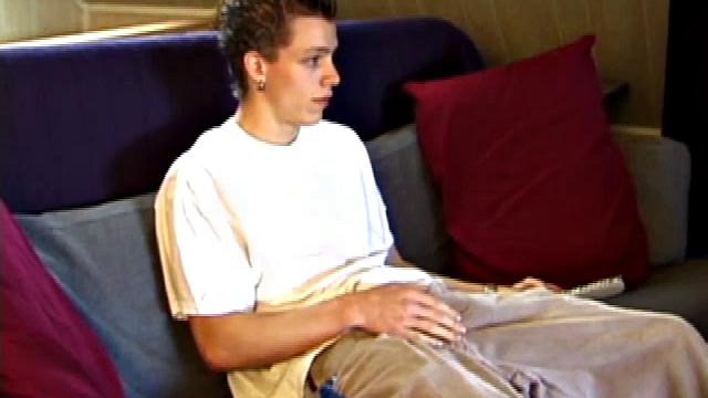 Shane pops in a new x-rated porn video and gets ready for a hot jack off session. He works his stiff dick with both hands, edging himself to a crazy finish. In the end Shane sends a warm cum load flying over his shoulder.