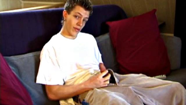 Shane pops in a new x-rated porn video and gets ready for a hot jack off session. He works his stiff dick with both hands, edging himself to a crazy finish. In the end Shane sends a warm cum load flying over his shoulder.