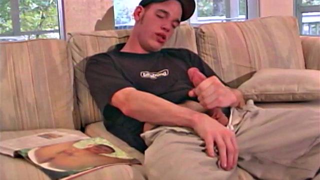 Jaison Lawrence is one super cute man. Watch as this young man flips through a porn magazine, while working himself through his clothing. He ends up naked on th esofa and stroking that big 8-inch cock of his.