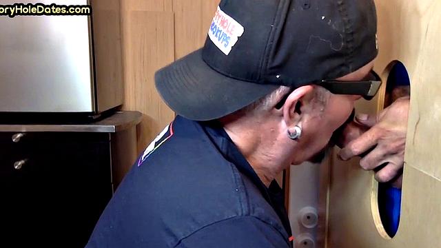 Gloryhole amateur mature deepthroats cock in home video