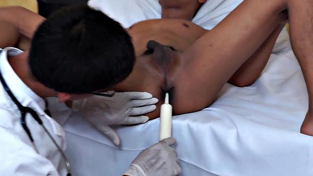 Enema Asian twink in examination at doctor's infirmary