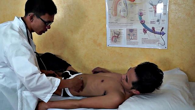 Enema Asian twink in examination at doctor's infirmary