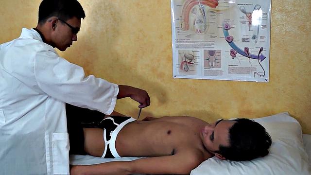 Enema Asian twink in examination at doctor's infirmary