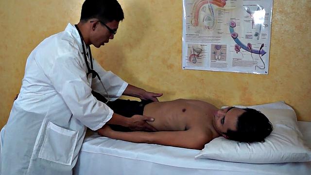 Enema Asian twink in examination at doctor's infirmary