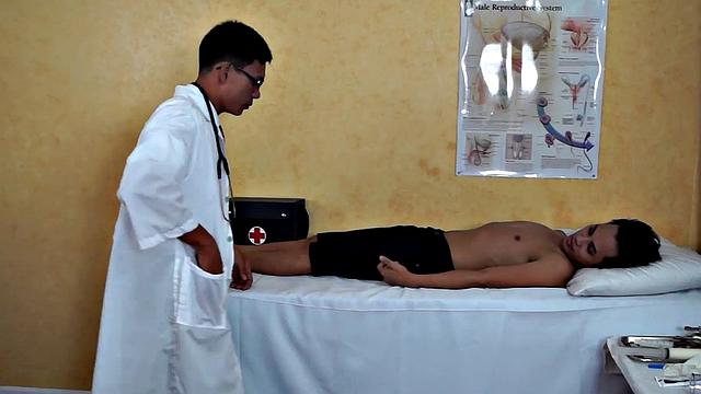 Enema Asian twink in examination at doctor's infirmary