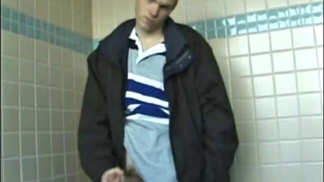 Christian goes into a men's room with glory holes, whips out his cock, and starts jacking off. The camera gives us hot perspectives of this straight boy as he works himself to the edge.