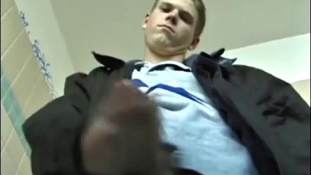 Christian goes into a men's room with glory holes, whips out his cock, and starts jacking off. The camera gives us hot perspectives of this straight boy as he works himself to the edge.