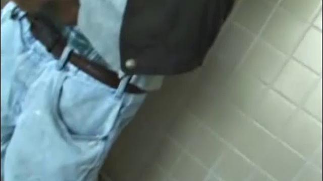 Christian goes into a men's room with glory holes, whips out his cock, and starts jacking off. The camera gives us hot perspectives of this straight boy as he works himself to the edge.