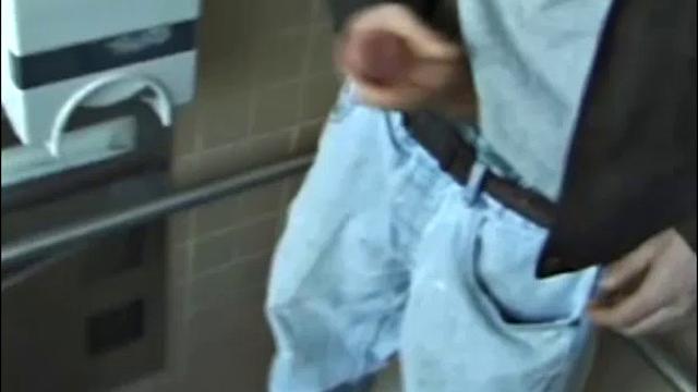 Christian goes into a men's room with glory holes, whips out his cock, and starts jacking off. The camera gives us hot perspectives of this straight boy as he works himself to the edge.