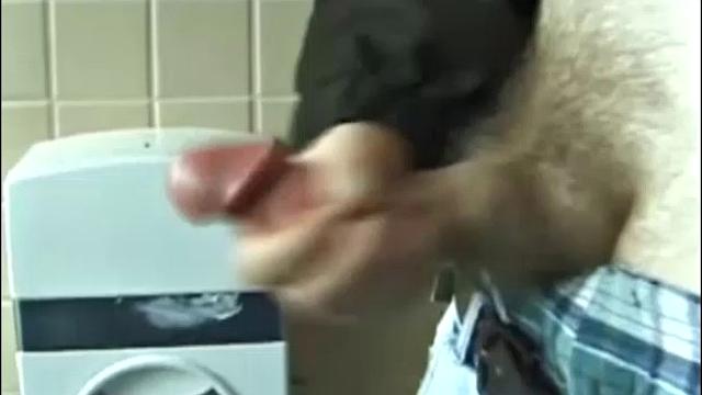 Christian goes into a men's room with glory holes, whips out his cock, and starts jacking off. The camera gives us hot perspectives of this straight boy as he works himself to the edge.