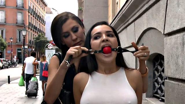 Submissive public babe throat fucked in outdoor public 3some