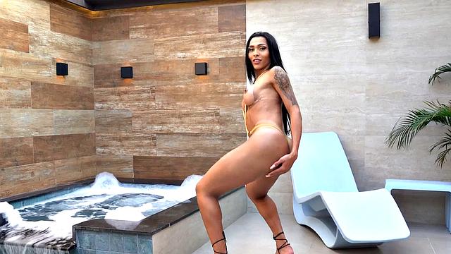 Transsexual beauty fucked in the asshole by big white dick