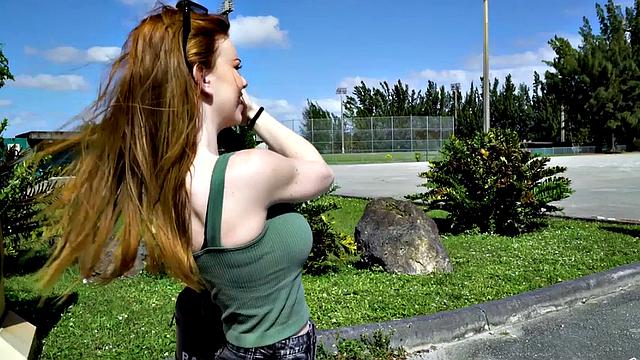 Redhead teen with huge tits sucks big dick in car for cash