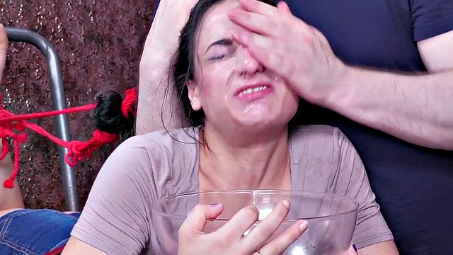 Facialized teen slave bound and throat fucked