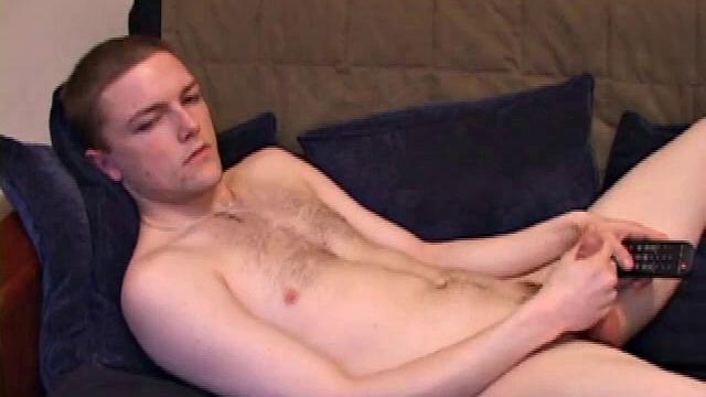 Axel takes his time stroking his dick and bringing it to life as he watches a porn video. He works his hand back and forth, teasing the length of his shaft.