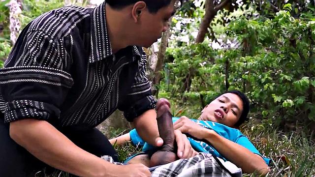 Asian twink sucked by doctor's mouth outdoors