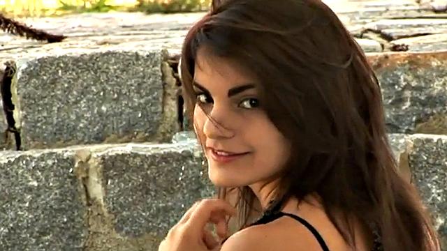 Naughty petite teen in the rain