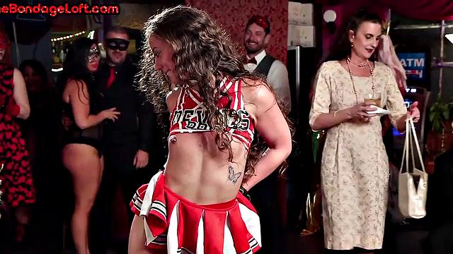 BDSM cheerleader whipped in public by dominant master