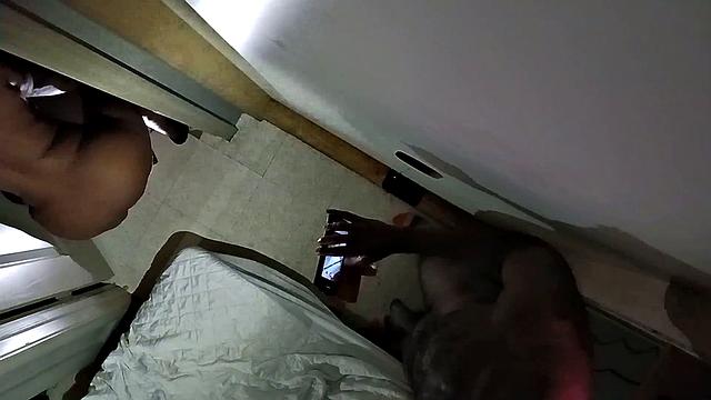 A Texas ebony MILF get her big ass and mouth satisfied in glory hole action