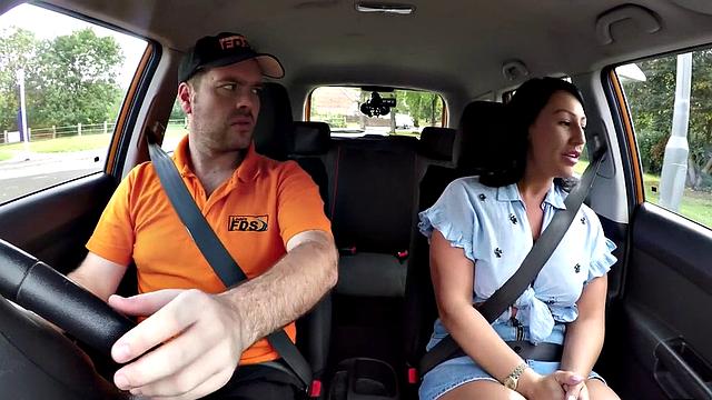 Busty British babe sucks off and rides her tutor in car