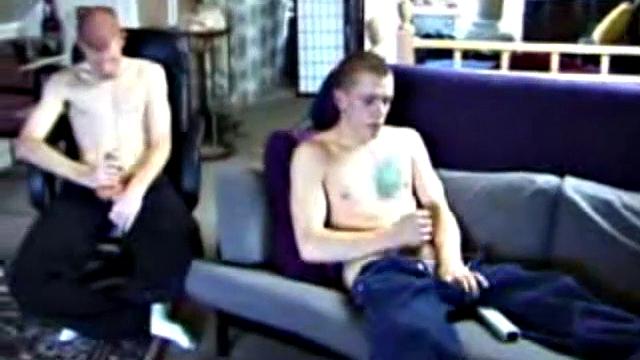 These two straight boys decide to jerk off while watching a porn video. The horny guys beat off and never once glance at the other, but the curiosity is there and it's obvious they're turned on by the other's presence.