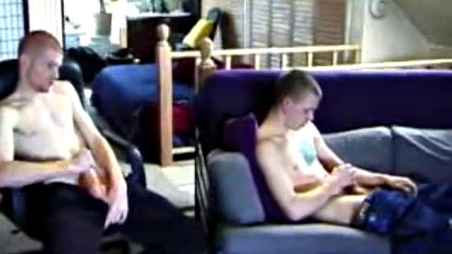 These two straight boys decide to jerk off while watching a porn video. The horny guys beat off and never once glance at the other, but the curiosity is there and it's obvious they're turned on by the other's presence.