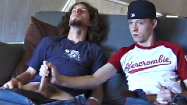 We join EJ and Adam with their cocks out and pants down. Curious, EJ leans over and starts stroking Adam's dick. Adam reciprocates by going down on EJ. EJ tries sucking dick by taking Adam's cock into his mouth.