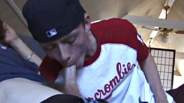 We join EJ and Adam with their cocks out and pants down. Curious, EJ leans over and starts stroking Adam's dick. Adam reciprocates by going down on EJ. EJ tries sucking dick by taking Adam's cock into his mouth.