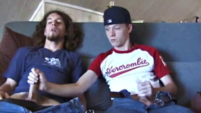 We join EJ and Adam with their cocks out and pants down. Curious, EJ leans over and starts stroking Adam's dick. Adam reciprocates by going down on EJ. EJ tries sucking dick by taking Adam's cock into his mouth.